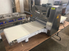 STAINLESS STEEL ELECTRIC TABLETOP DOUGH SHEETER WITH REVERSIBLE CONVEYOR BELTS, ADJUSTABLE ROLLER THICKNESS, EMERGENCY STOP BUTTON, AND FOLDING CONVEYOR TABLES. - 2