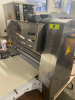 STAINLESS STEEL ELECTRIC TABLETOP DOUGH SHEETER WITH REVERSIBLE CONVEYOR BELTS, ADJUSTABLE ROLLER THICKNESS, EMERGENCY STOP BUTTON, AND FOLDING CONVEYOR TABLES. - 4