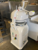 AUTOMATIC DOUGH ROUNDER DIVIDER. UNIT FEATURES A HEAVY-DUTY FLOOR-STANDING DESIGN WITH MANUAL OPERATING LEVERS AND CAST BASE.
