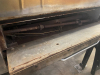 BAKERS PRIDE SINGLE DECK GAS PIZZA OVEN. STAINLESS STEEL EXTERIOR, STONE DECKS, INDEPENDENT DOORS, AND ADJUSTABLE TOP/BOTTOM HEAT CONTROL. UNIT IS MOUNTED ON A STEEL STAND WITH CASTERS - 5