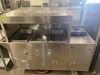 STAINLESS STEEL MOBILE CONCESSION FOOD CART WITH ENCLOSED STORAGE, OVERHEAD DISPLAY FRAME, SERVING SHELF, THREE PAN WELLS, DOUBLE BASIN HAND SINK, LOCKING CASH DRAWER, AND ROLLING CASTERS. UNIT FEATURES A STAINLESS STEEL CONSTRUCTION WITH VINYL SKIRTING - 2