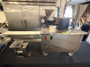 STAINLESS STEEL ELECTRIC AUTOMATIC DUMPLING / RAVIOLI FORMING MACHINE WITH STUFFING HOPPER, DOUGH HOPPER, FORMING ROLLER ASSEMBLY, CONVEYOR DISCHARGE, AND LOCKING SWIVEL CASTERS. UNIT FEATURES ADJUSTABLE STUFFING VOLUME CONTROL. - 2