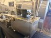 STAINLESS STEEL ELECTRIC AUTOMATIC DUMPLING / RAVIOLI FORMING MACHINE WITH STUFFING HOPPER, DOUGH HOPPER, FORMING ROLLER ASSEMBLY, CONVEYOR DISCHARGE, AND LOCKING SWIVEL CASTERS. UNIT FEATURES ADJUSTABLE STUFFING VOLUME CONTROL. - 4