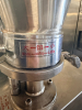 STAINLESS STEEL ELECTRIC AUTOMATIC DUMPLING / RAVIOLI FORMING MACHINE WITH STUFFING HOPPER, DOUGH HOPPER, FORMING ROLLER ASSEMBLY, CONVEYOR DISCHARGE, AND LOCKING SWIVEL CASTERS. UNIT FEATURES ADJUSTABLE STUFFING VOLUME CONTROL. - 10