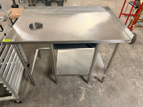 48" X 30" STAINLESS TABLE W/ SIDE AND BACK SPLASH.
