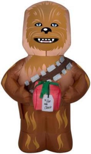 DESCRIPTION: (1) AIRBLOWN CHEWBACCA BRAND/MODEL: STAR WARS/111777 INFORMATION: WITH PRESENT/BROWN/RARE RETAIL$: 32.99 SIZE: 60" X 28" X 36" QTY: 1