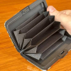 (1) CASE OF APPROX (120) METAL WALLETS