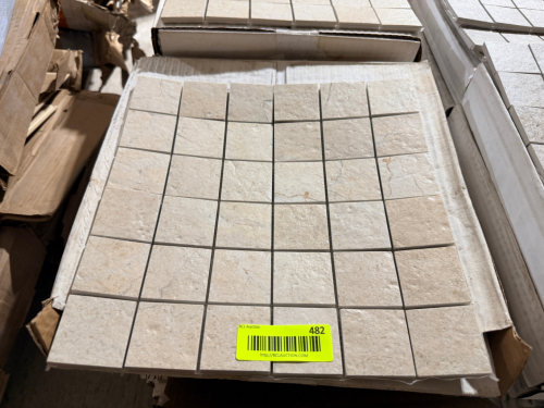 (16) BOXES OF BEIGE NATURAL STONE MOSAIC TILE CONSISTING OF SQUARE-CUT STONE PIECES MOUNTED ON MESH-BACKED SHEETS IN A GRID PATTERN.