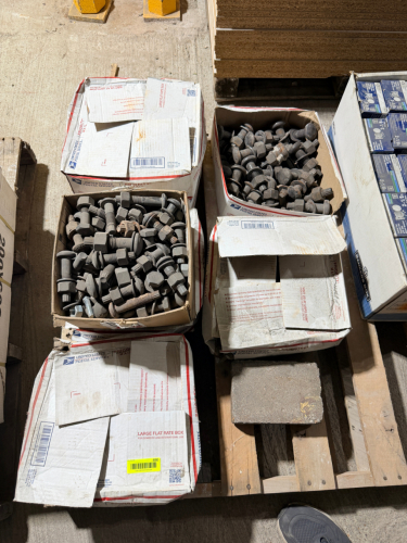 (1) PALLET OF HEAVY-DUTY STEEL STRUCTURAL BOLTS WITH HEX NUTS AND HARDENED FLAT WASHERS. LOT CONTAINS ASSORTED LARGE-DIAMETER FASTENERS WITH PARTIAL THREADS AND SPLINE/TENSION-CONTROL STYLE ENDS.