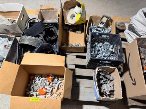 PALLET OF INDUSTRIAL HARDWARE INCLUDING GALVANIZED WIRE ROPE CLIPS, PIPE AND CONDUIT CLAMPS, HANGERS, BRACKETS, STRAPS, RUBBER BELTING/SLEEVES, PLASTIC PIPE/CONDUIT SUPPORT CLIPS, AND ASSORTED MOUNTING COMPONENTS.