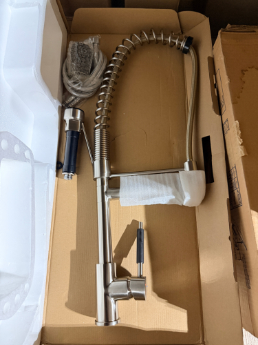 (1) COMMERCIAL-STYLE SINGLE-HANDLE KITCHEN FAUCET WITH BRUSHED METAL FINISH, HIGH-ARC SPRING SPOUT, FLEXIBLE HOSE, PULL-DOWN SPRAY HEAD, SIDE SUPPORT ARM, AND SINGLE-LEVER CONTROL. BRAIDED WATER SUPPLY LINES AND INSTALLATION HARDWARE ARE INCLUDED.