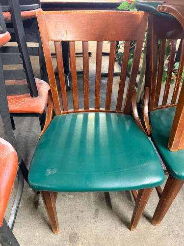 (11) BAR BACK WOODEN CHAIRS W/ GREEN PADDED SEATS.