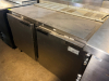 TWO-DOOR COMMERCIAL UNDERCOUNTER REFRIGERATOR WITH STAINLESS STEEL TOP, STAINLESS STEEL INTERIOR, TWO SOLID HINGED DOORS, WIRE SHELVING, REAR VENTILATION, AND CASTERS. - 3
