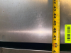 TWO-DOOR COMMERCIAL UNDERCOUNTER REFRIGERATOR WITH STAINLESS STEEL TOP, STAINLESS STEEL INTERIOR, TWO SOLID HINGED DOORS, WIRE SHELVING, REAR VENTILATION, AND CASTERS. - 6