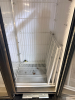 TRUE THREE-DOOR GLASS DISPLAY FREEZER WITH THREE HINGED GLASS DOORS, INTERIOR LED LIGHTING, ADJUSTABLE COATED WIRE SHELVING, BOTTOM-MOUNT DUAL COMPRESSOR REFRIGERATION SYSTEM, AND BLACK EXTERIOR FINISH. - 5