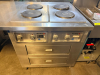 82" W X 36" STAINLESS STEEL ELECTRIC FOUR-BURNER HOTPLATE/RANGE WITH FOUR SOLID ROUND CAST-IRON HEATING ELEMENTS, INDEPENDENT TEMPERATURE CONTROLS, TWO LARGE LOWER STORAGE/WARMING DRAWERS, AND INTEGRATED STAINLESS STEEL WORKTABLE WITH DEEP SINK, FAUCET, A - 2