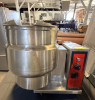 VULCAN-HART 12-GALLON TILTING STEAM-JACKETED KETTLE WITH STAINLESS STEEL CONSTRUCTION, MANUAL TILT MECHANISM, TILT-LOCK CONTROL, TEMPERATURE CONTROL, LOW-WATER INDICATOR, HEAT INDICATOR, AND INTEGRAL ELECTRIC HEATING SYSTEM. KETTLE INTERIOR IS GRADUATED T