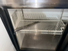 TRUE 72" THREE-DOOR REFRIGERATED SANDWICH/SALAD PREP TABLE WITH STAINLESS STEEL EXTERIOR, THREE SOLID SWING DOORS, REMOVABLE WIRE SHELVING, FULL-LENGTH POLY CUTTING BOARD, AND HINGED TOP INGREDIENT-PAN COMPARTMENT - 5