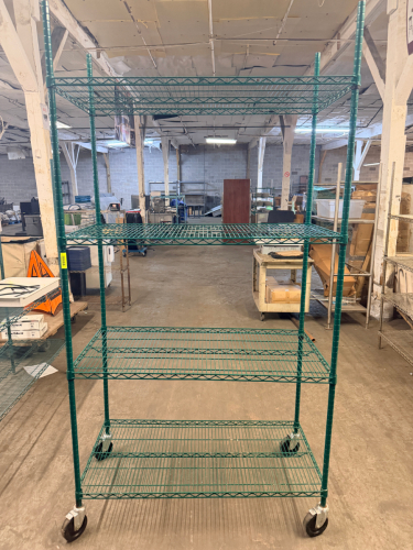 48" X 24" FOUR TIER COATED WIRE SHELF ON CASTERS.