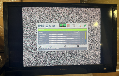 2011 INSIGNIA 42" FLAT SCREEN TV W/ PARTIAL WALL MOUNT BRACKET.