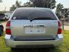 (1) SILVER FOUR-DOOR SUV WITH BLACK LEATHER INTERIOR, AUTOMATIC TRANSMISSION, ALLOY WHEELS, ROOF RACK, RUNNING BOARDS, POWER SEATS, AND WOODGRAIN INTERIOR TRIM. VIN: 2HNYD18841H515534. OPERATING CONDITION UNKNOWN. SOLD AS-IS. - 4