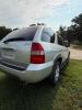 (1) SILVER FOUR-DOOR SUV WITH BLACK LEATHER INTERIOR, AUTOMATIC TRANSMISSION, ALLOY WHEELS, ROOF RACK, RUNNING BOARDS, POWER SEATS, AND WOODGRAIN INTERIOR TRIM. VIN: 2HNYD18841H515534. OPERATING CONDITION UNKNOWN. SOLD AS-IS. - 7