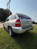 (1) SILVER FOUR-DOOR SUV WITH BLACK LEATHER INTERIOR, AUTOMATIC TRANSMISSION, ALLOY WHEELS, ROOF RACK, RUNNING BOARDS, POWER SEATS, AND WOODGRAIN INTERIOR TRIM. VIN: 2HNYD18841H515534. OPERATING CONDITION UNKNOWN. SOLD AS-IS. - 15