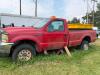 (1) RED FORD F-350 SUPER DUTY REGULAR-CAB PICKUP. TRUCK SHOWS HEAVY WEATHERING, DIRT, RUST, MISSING FRONT GRILLE, MISSING REAR TAILLIGHT ASSEMBLIES, AND OTHER VISIBLE DAMAGE OR INCOMPLETE COMPONENTS. INTERIOR HAS CLOTH BENCH SEAT, MANUAL 4X4 FLOOR SELECTO