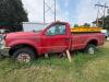 (1) RED FORD F-350 SUPER DUTY REGULAR-CAB PICKUP. TRUCK SHOWS HEAVY WEATHERING, DIRT, RUST, MISSING FRONT GRILLE, MISSING REAR TAILLIGHT ASSEMBLIES, AND OTHER VISIBLE DAMAGE OR INCOMPLETE COMPONENTS. INTERIOR HAS CLOTH BENCH SEAT, MANUAL 4X4 FLOOR SELECTO - 3