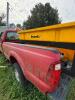 (1) RED FORD F-350 SUPER DUTY REGULAR-CAB PICKUP. TRUCK SHOWS HEAVY WEATHERING, DIRT, RUST, MISSING FRONT GRILLE, MISSING REAR TAILLIGHT ASSEMBLIES, AND OTHER VISIBLE DAMAGE OR INCOMPLETE COMPONENTS. INTERIOR HAS CLOTH BENCH SEAT, MANUAL 4X4 FLOOR SELECTO - 5