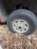 (1) RED FORD F-350 SUPER DUTY REGULAR-CAB PICKUP. TRUCK SHOWS HEAVY WEATHERING, DIRT, RUST, MISSING FRONT GRILLE, MISSING REAR TAILLIGHT ASSEMBLIES, AND OTHER VISIBLE DAMAGE OR INCOMPLETE COMPONENTS. INTERIOR HAS CLOTH BENCH SEAT, MANUAL 4X4 FLOOR SELECTO - 11