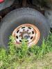 (1) RED FORD F-350 SUPER DUTY REGULAR-CAB PICKUP. TRUCK SHOWS HEAVY WEATHERING, DIRT, RUST, MISSING FRONT GRILLE, MISSING REAR TAILLIGHT ASSEMBLIES, AND OTHER VISIBLE DAMAGE OR INCOMPLETE COMPONENTS. INTERIOR HAS CLOTH BENCH SEAT, MANUAL 4X4 FLOOR SELECTO - 12