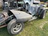 (1) BLACK JEEP WRANGLER PROJECT VEHICLE WITH REMOVABLE SOFT-TOP COMPONENTS, ROUND-HEADLIGHT GRILLE, AFTERMARKET WHEELS, GOODYEAR WRANGLER TIRES, SIDE STEPS, FRONT AUXILIARY LIGHTS, FUEL TANK, SUSPENSION, AXLES, AND VARIOUS LOOSE PARTS. VEHICLE PRESENTS A - 4
