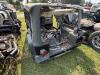 (1) BLACK JEEP WRANGLER 4.0L SPORT OFFERED AS A PROJECT, RESTORATION, OR PARTS VEHICLE. INCLUDES BODY TUB, WINDSHIELD FRAME AND GLASS, ROLL BAR ASSEMBLY, DAMAGED SOFT TOP, DASH COMPONENTS, STEERING WHEEL, BUMPERS, FENDER FLARES, SIDE STEPS, AND ASSORTED L - 4
