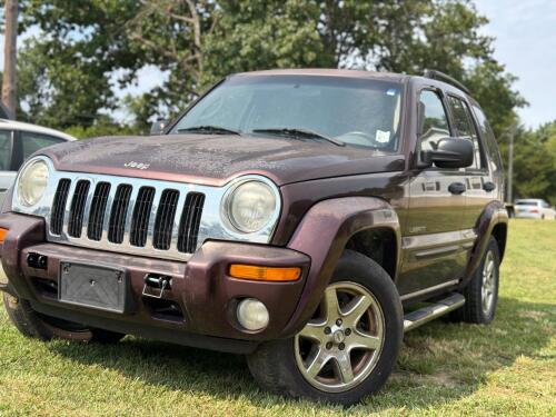 (1) MAROON FOUR-DOOR JEEP LIBERTY LIMITED EQUIPPED WITH A 3.7L V6 ENGINE, AUTOMATIC TRANSMISSION, SUNROOF, ROOF RACK, RUNNING BOARDS, REAR-MOUNTED SPARE TIRE, AND CLOTH INTERIOR. ODOMETER DISPLAYS 172,062 MILES. SOLD AS SHOWN.