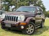 (1) MAROON FOUR-DOOR JEEP LIBERTY LIMITED EQUIPPED WITH A 3.7L V6 ENGINE, AUTOMATIC TRANSMISSION, SUNROOF, ROOF RACK, RUNNING BOARDS, REAR-MOUNTED SPARE TIRE, AND CLOTH INTERIOR. ODOMETER DISPLAYS 172,062 MILES. SOLD AS SHOWN.