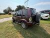 (1) MAROON FOUR-DOOR JEEP LIBERTY LIMITED EQUIPPED WITH A 3.7L V6 ENGINE, AUTOMATIC TRANSMISSION, SUNROOF, ROOF RACK, RUNNING BOARDS, REAR-MOUNTED SPARE TIRE, AND CLOTH INTERIOR. ODOMETER DISPLAYS 172,062 MILES. SOLD AS SHOWN. - 3