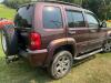 (1) MAROON FOUR-DOOR JEEP LIBERTY LIMITED EQUIPPED WITH A 3.7L V6 ENGINE, AUTOMATIC TRANSMISSION, SUNROOF, ROOF RACK, RUNNING BOARDS, REAR-MOUNTED SPARE TIRE, AND CLOTH INTERIOR. ODOMETER DISPLAYS 172,062 MILES. SOLD AS SHOWN. - 5