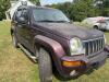 (1) MAROON FOUR-DOOR JEEP LIBERTY LIMITED EQUIPPED WITH A 3.7L V6 ENGINE, AUTOMATIC TRANSMISSION, SUNROOF, ROOF RACK, RUNNING BOARDS, REAR-MOUNTED SPARE TIRE, AND CLOTH INTERIOR. ODOMETER DISPLAYS 172,062 MILES. SOLD AS SHOWN. - 7