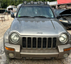 (1) GRAY JEEP LIBERTY. DOES NOT RUN.