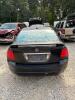 (1) BLACK ACURA 4 DOOR - 2