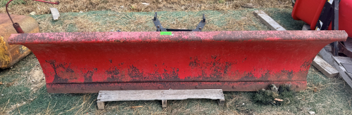 HEAVY-DUTY STRAIGHT SNOW PLOW BLADE WITH A-FRAME, TRIP SPRINGS, SKID SHOES, AND MANUAL ANGLE ADJUSTMENT ASSEMBLY. BLADE SHOWS SURFACE RUST, PAINT LOSS, AND WEAR CONSISTENT WITH PRIOR USE.