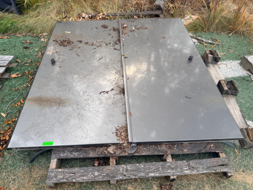 TWO PANEL STAINLESS TRUCK BED COVER W/ CENTER HINGE.