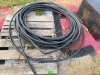 (1) BUNDLE OF 1" PLASTIC IRRIGATION PIPE.