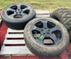 2 JEEP 5-SPOKE ALLOY WHEELS WITH GOODYEAR FORTERA HL TIRES.