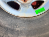 SINGLE GOODYEAR WRANGLER TIRE MOUNTED ON 6-LUG ALUMINUM WHEEL. - 2