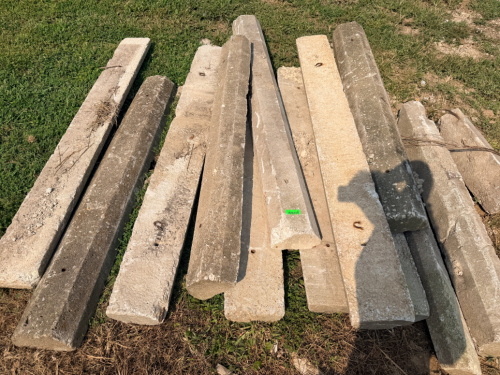 12 PRECAST CONCRETE CURBS / BUMPERS.