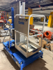 GENIE VERTICAL PERSONNEL LIFT WITH TELESCOPING ALUMINUM MAST, ALUMINUM WORK PLATFORM WITH GUARDRAILS, PLATFORM CONTROLS, GROUND CONTROLS, EMERGENCY STOP, OUTRIGGERS, HYDRAULIC LIFT SYSTEM, BATTERY CHARGER, AND MANUAL-ROLLING BASE. - 8