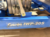 GENIE VERTICAL PERSONNEL LIFT WITH TELESCOPING ALUMINUM MAST, ALUMINUM WORK PLATFORM WITH GUARDRAILS, PLATFORM CONTROLS, GROUND CONTROLS, EMERGENCY STOP, OUTRIGGERS, HYDRAULIC LIFT SYSTEM, BATTERY CHARGER, AND MANUAL-ROLLING BASE. - 9