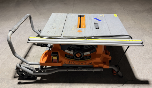 10-IN. PORTABLE JOBSITE TABLE SAW WITH ALUMINUM WORK TABLE, EXTENDABLE RIP FENCE SYSTEM, ADJUSTABLE BLADE HEIGHT AND BEVEL, ON/OFF SAFETY SWITCH, AND INTEGRATED TS-UV MOBILE FOLDING STAND WITH TRANSPORT WHEELS AND FOOT-ASSISTED SETUP